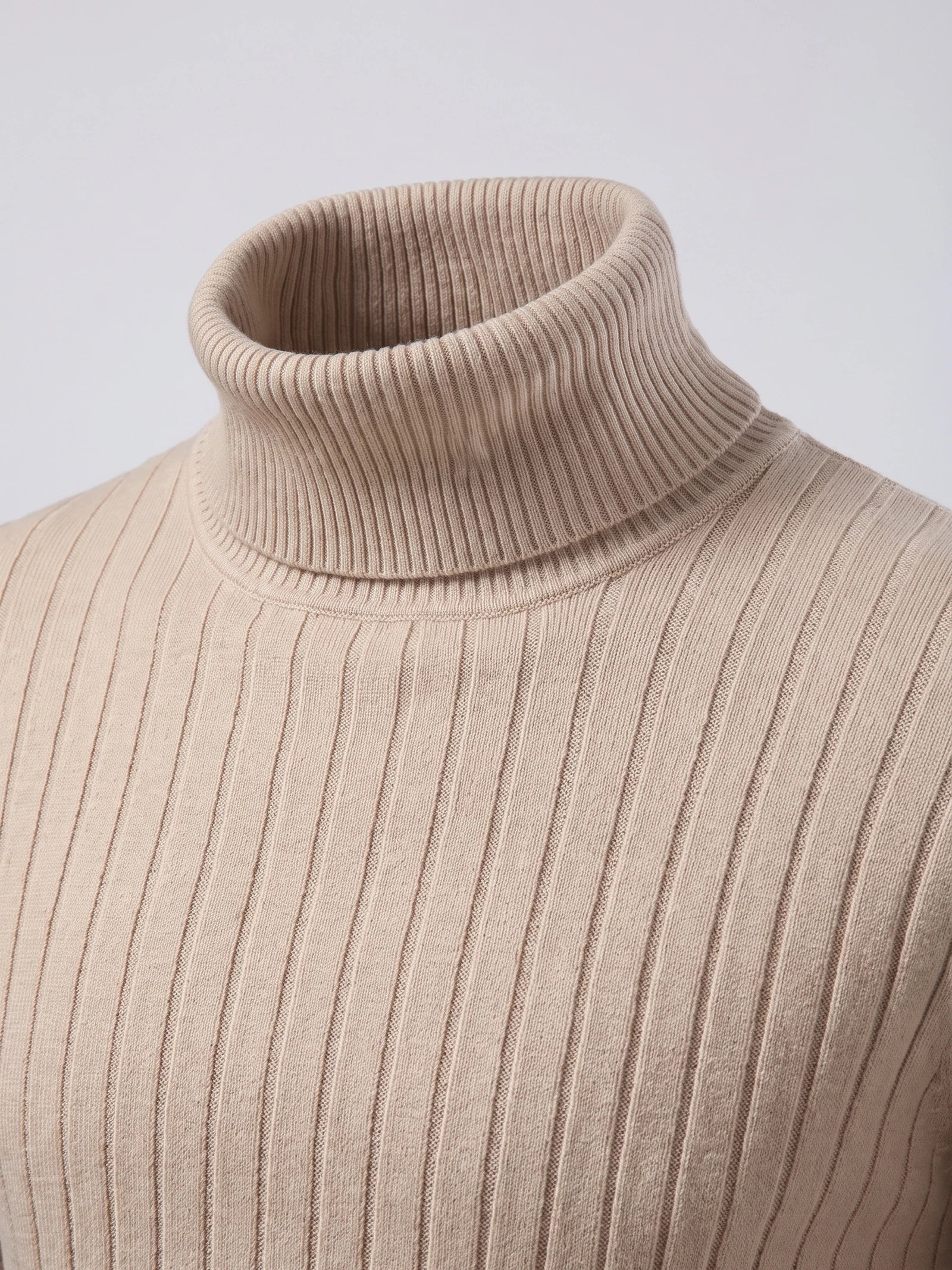 Close-up of the Khaki men's Turtleneck Sweater showing its ribbed fold-over collar and vertical knit texture.