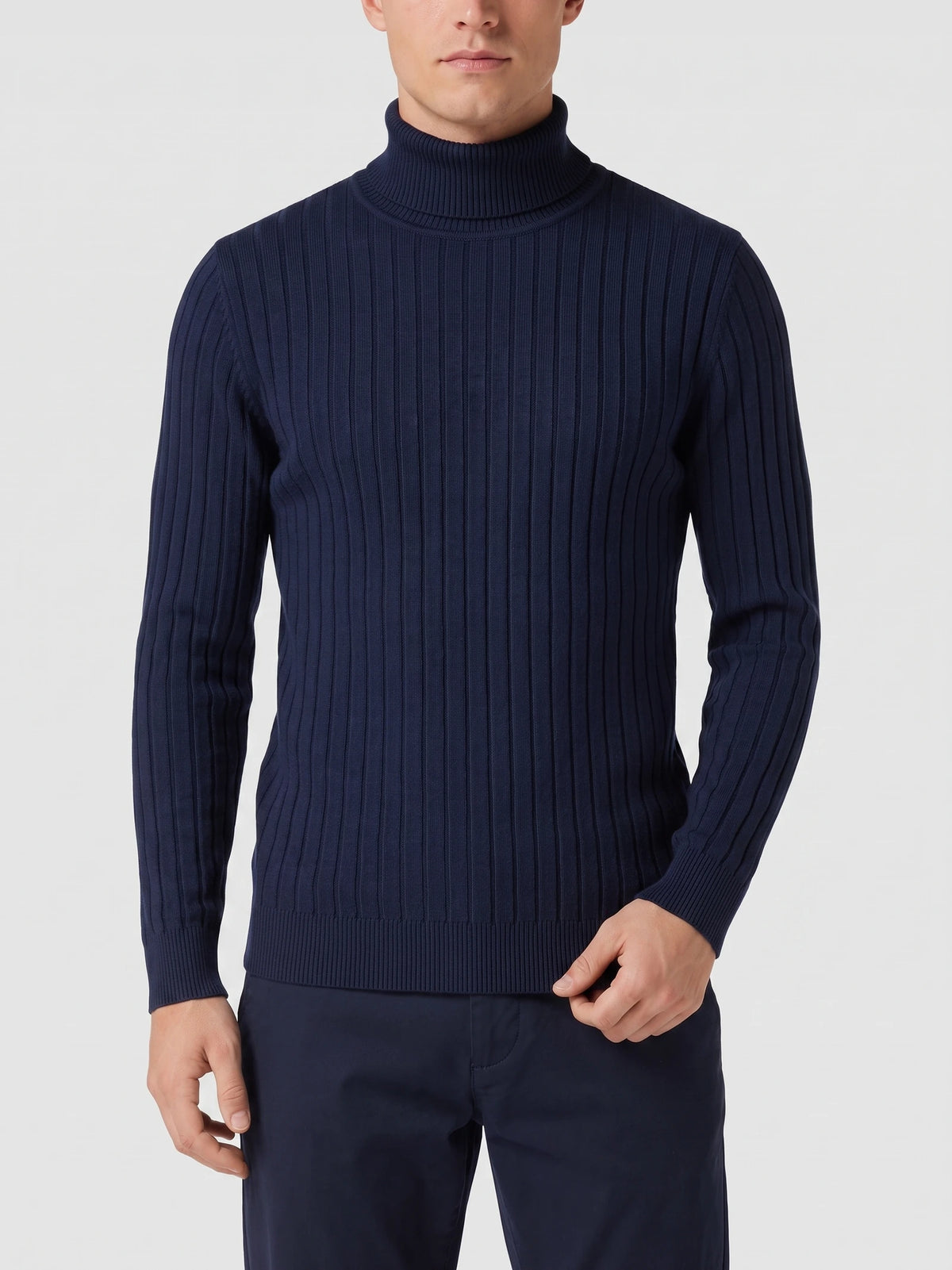 Front studio view of a model wearing a Navy ribbed knit Turtleneck Sweater.