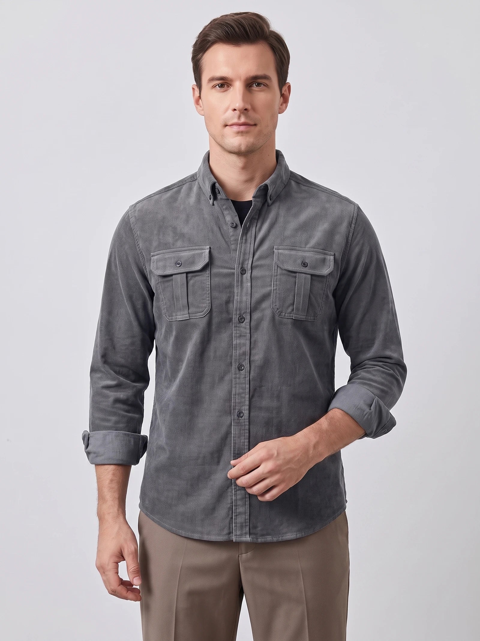 Front studio view of a model wearing a Gray Twill Tweed Shirt with a button-down collar and two button-flap chest pockets.