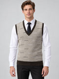 Front studio view of a model wearing a Beige v neck sweater vest with ribbed trim and a subtle linear pattern over a dress shirt and tie.