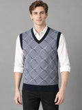 Front studio view of a model wearing a Gray v neck sweater vest with an argyle knit pattern over a collared shirt.