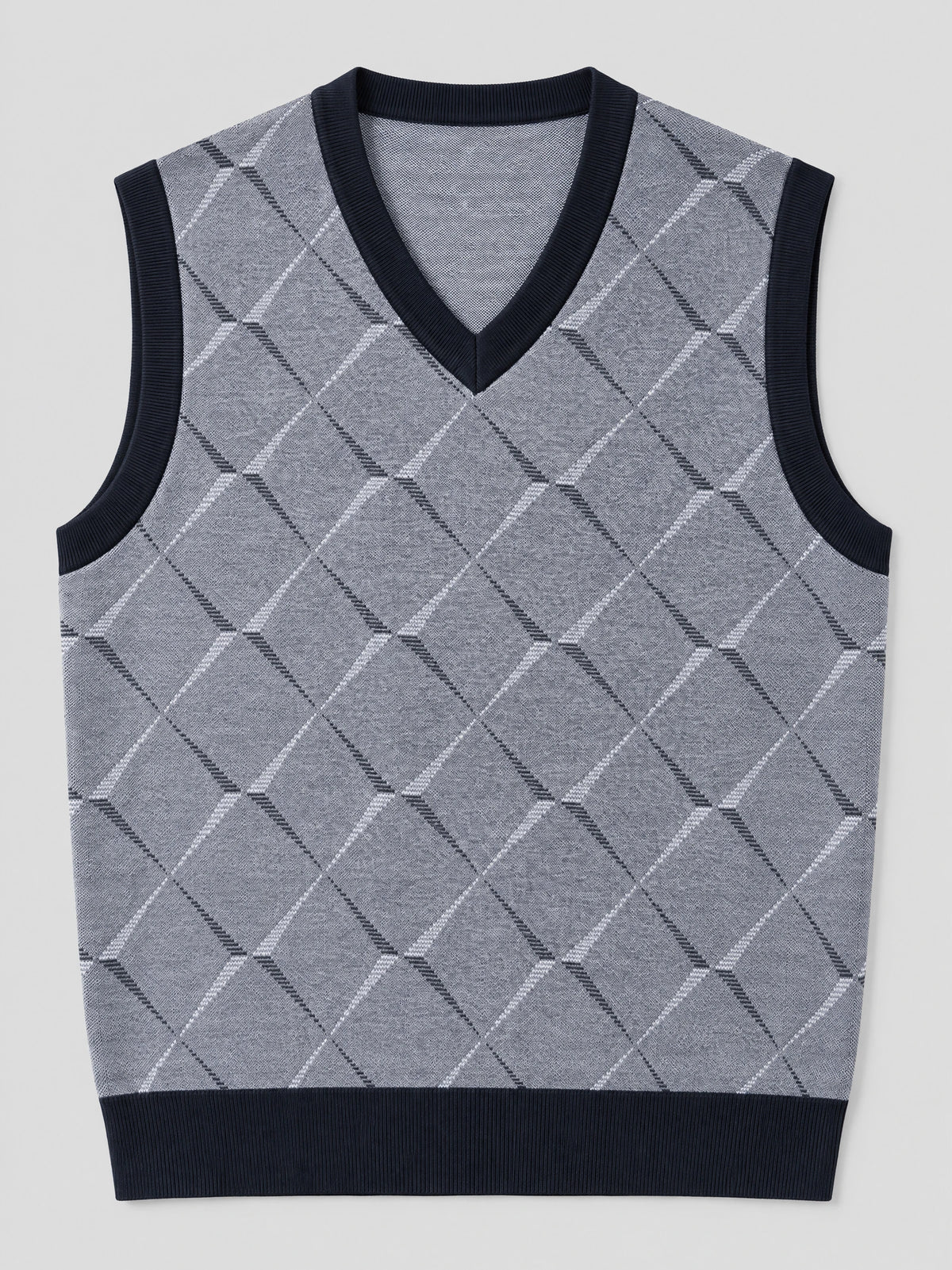 Gray v neck sweater vest laid flat, featuring an argyle knit pattern and ribbed V-neck, armholes, and hem.