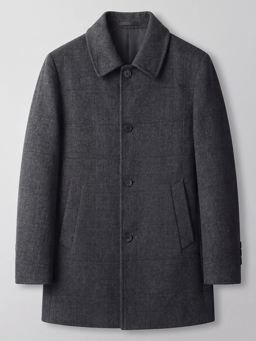 Black men’s wool trench coat laid flat, featuring a wide collar, button-front closure, and angled flap pockets.