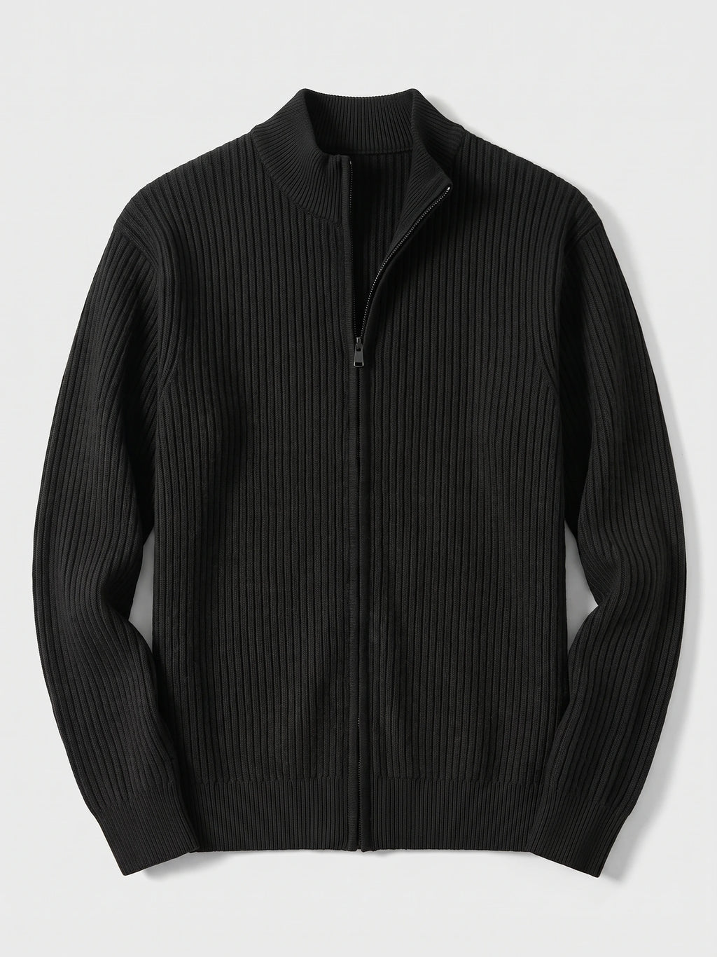 Black zip up cardigan laid flat, featuring a ribbed knit texture, stand collar, and long sleeves.